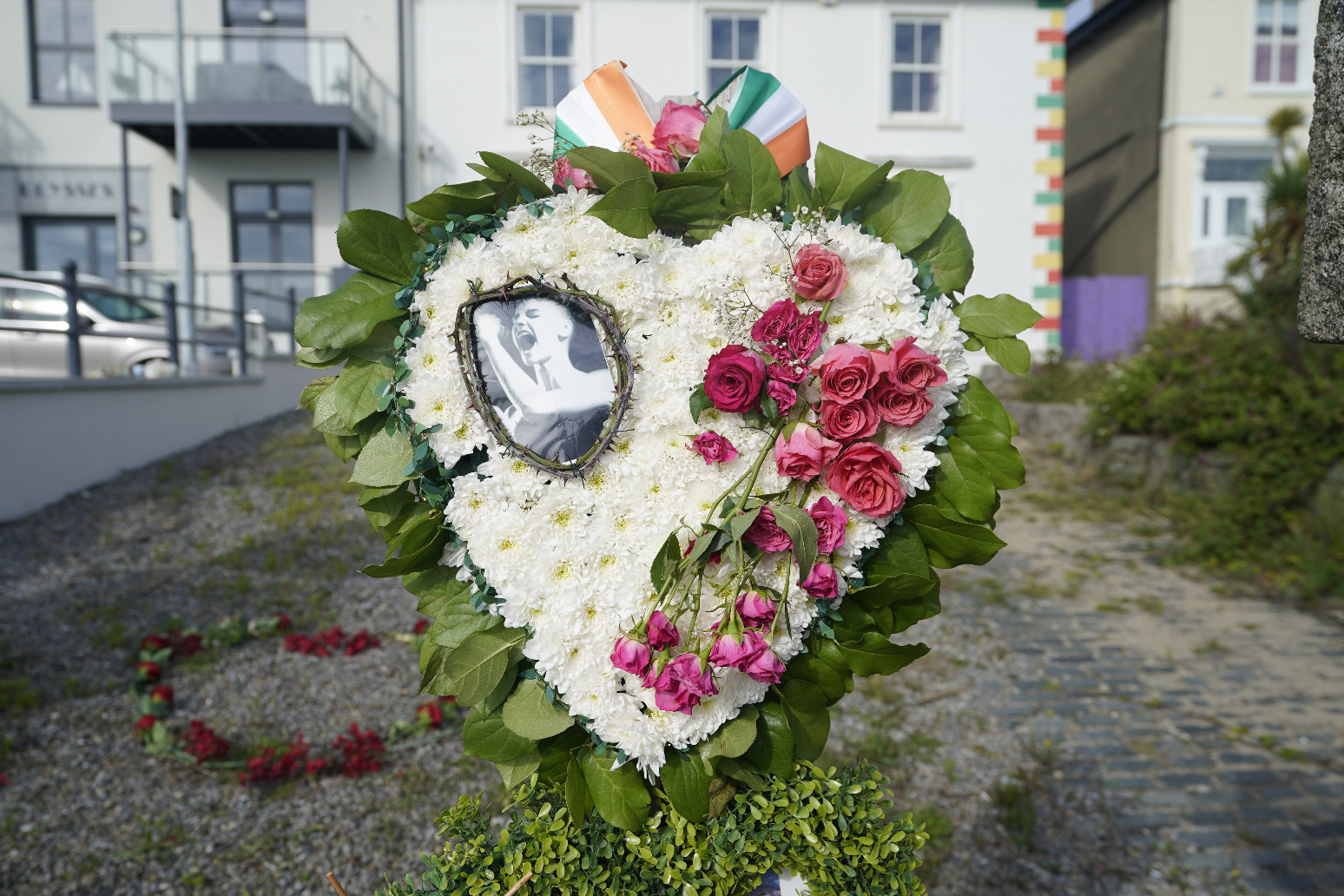 Fans lay tributes and light candles for Sinead O’Connor ahead of funeral