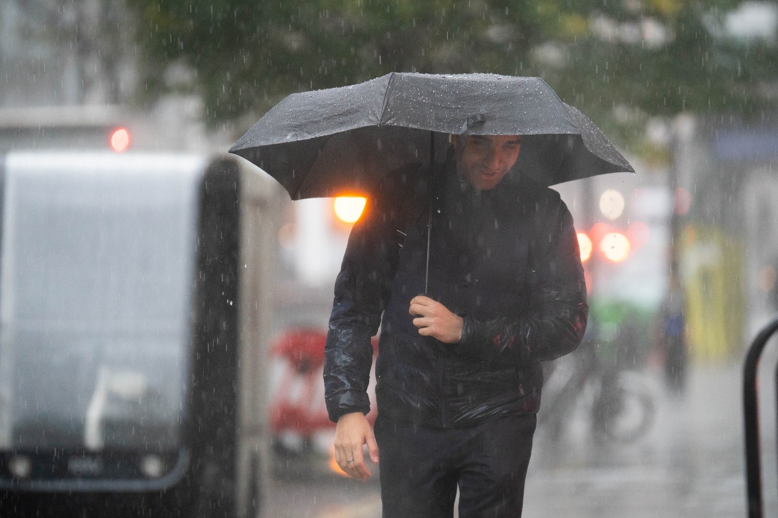 Train passengers face delays as heavy rain leads to flood warnings