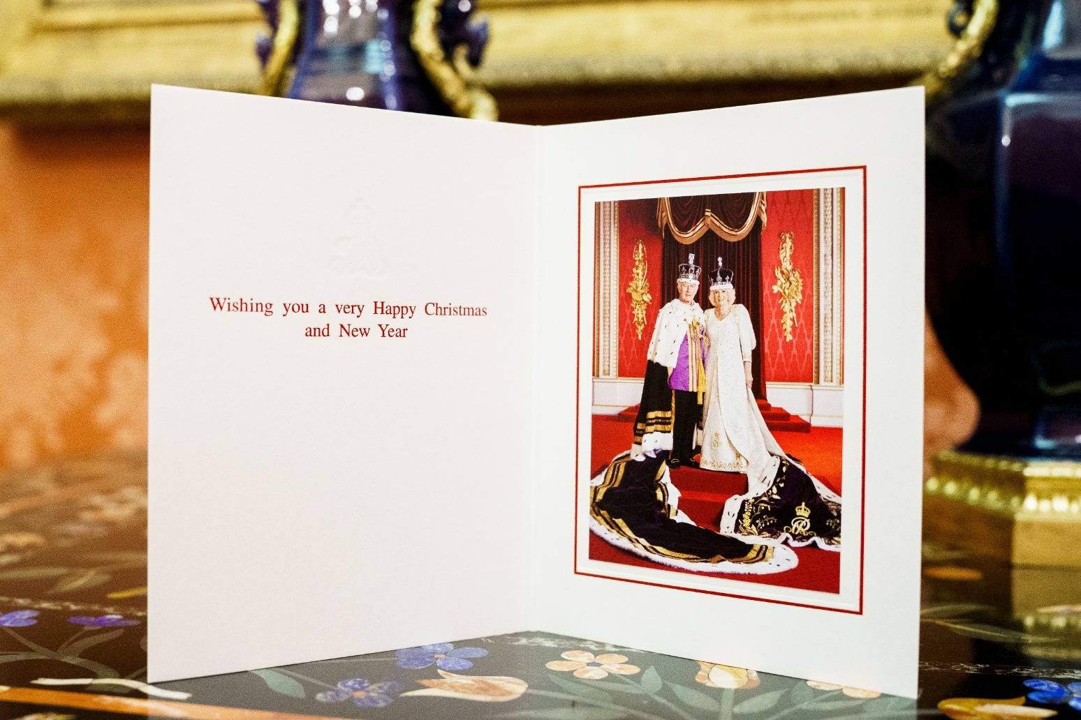King chooses coronation Christmas card but family photo for William and Kate