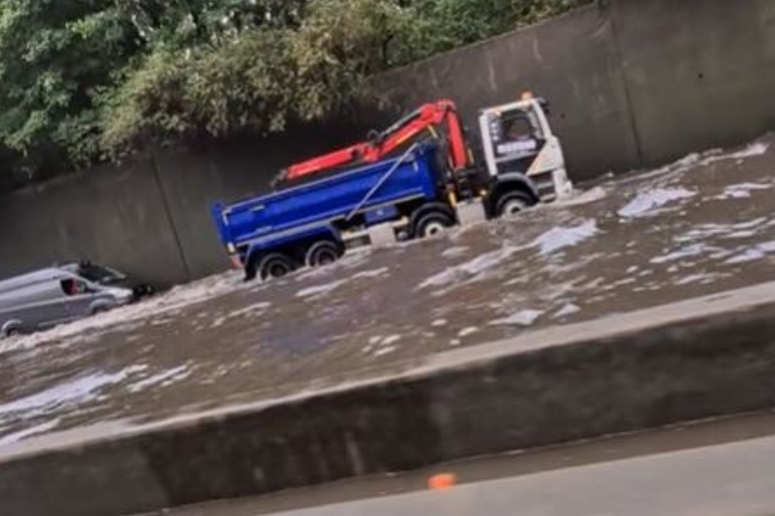 Storms to continue as England hit by flash flooding