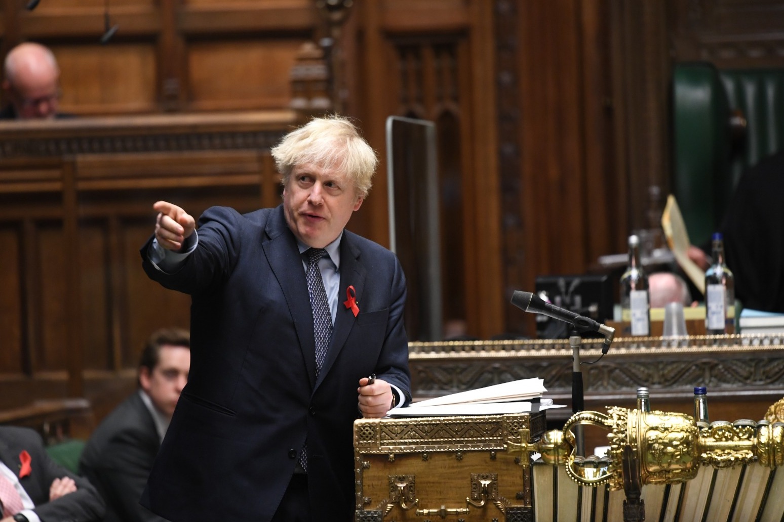 Commons backs Johnson’s Covid tiers despite threat of rebellion from Tory MPs