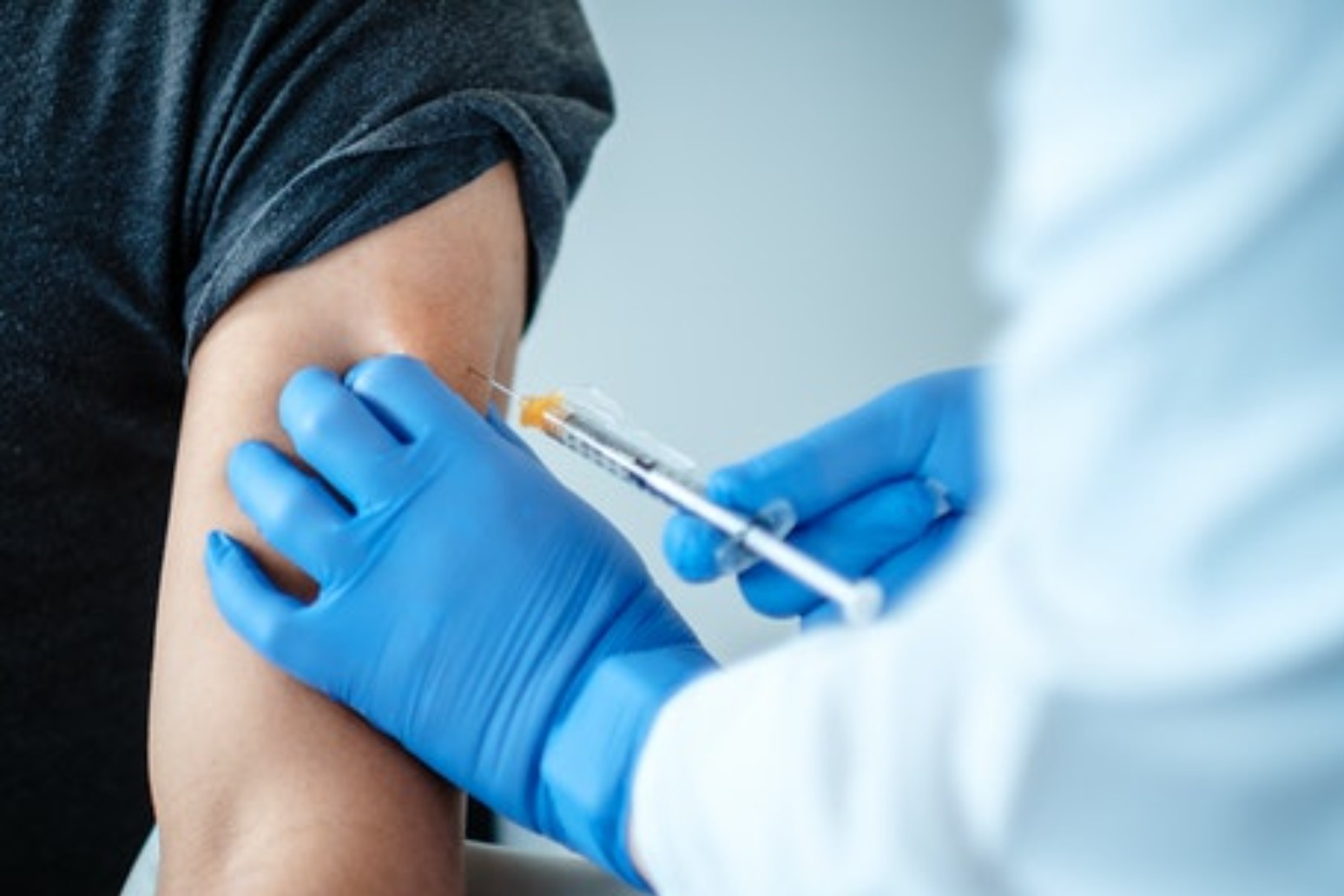 Regulator defends speed of UK vaccine approval as first batch arrives