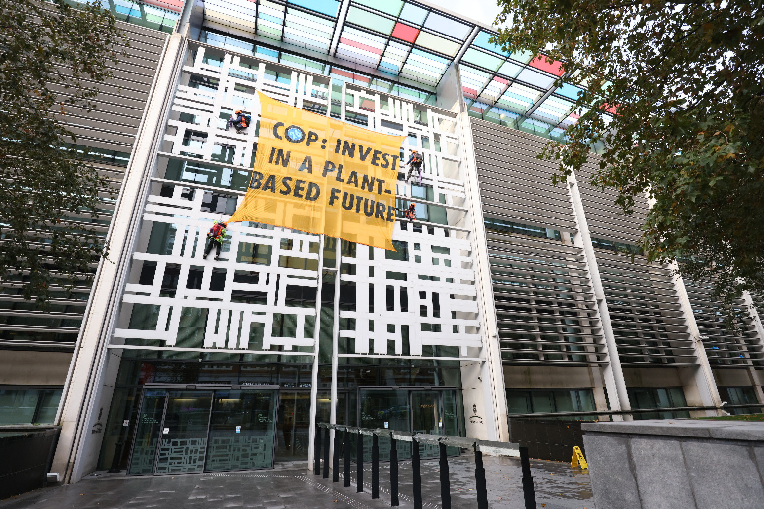 Activists scale Defra building in call for meat and dairy farm subsidies to end