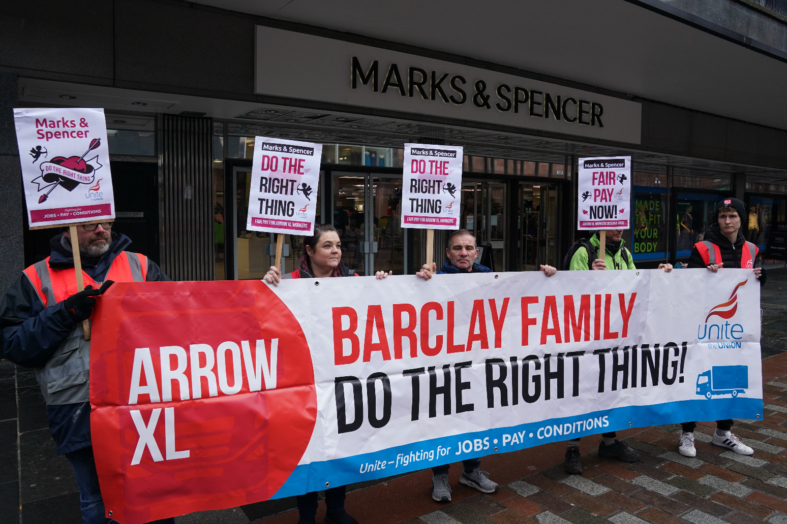 Staff protest at M&S stores over chain’s use of pay dispute logistics group