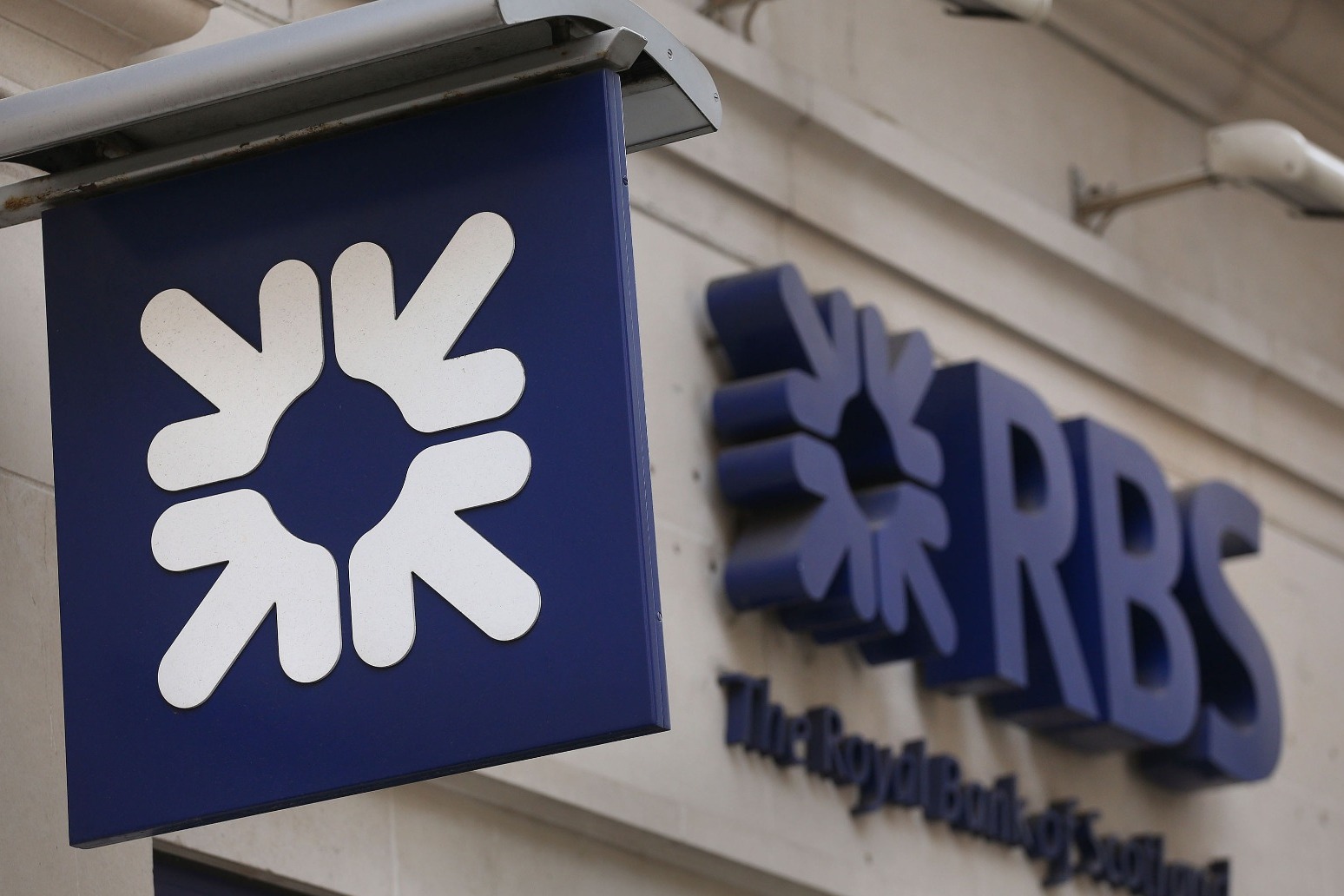 RBS SWINGS TO A LOSS AFTER £900M PPI HIT