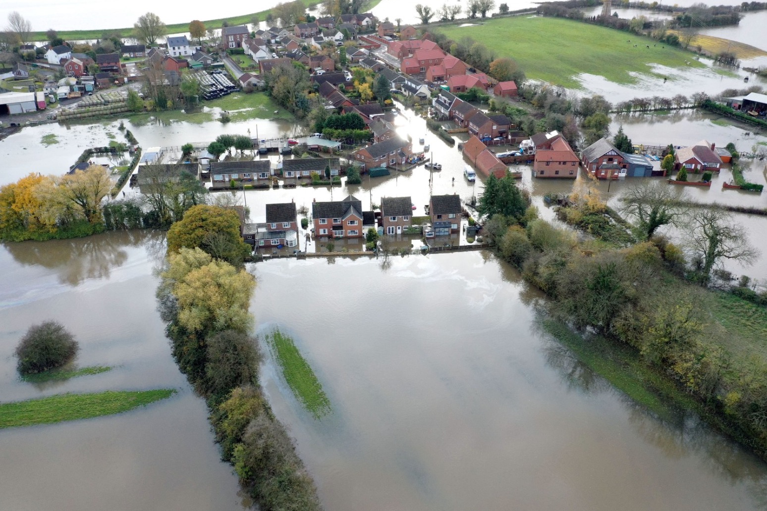 RAIN SET TO EASE IN FLOOD-STRICKEN AREAS AS JOHNSON CALLS COBRA MEETING
